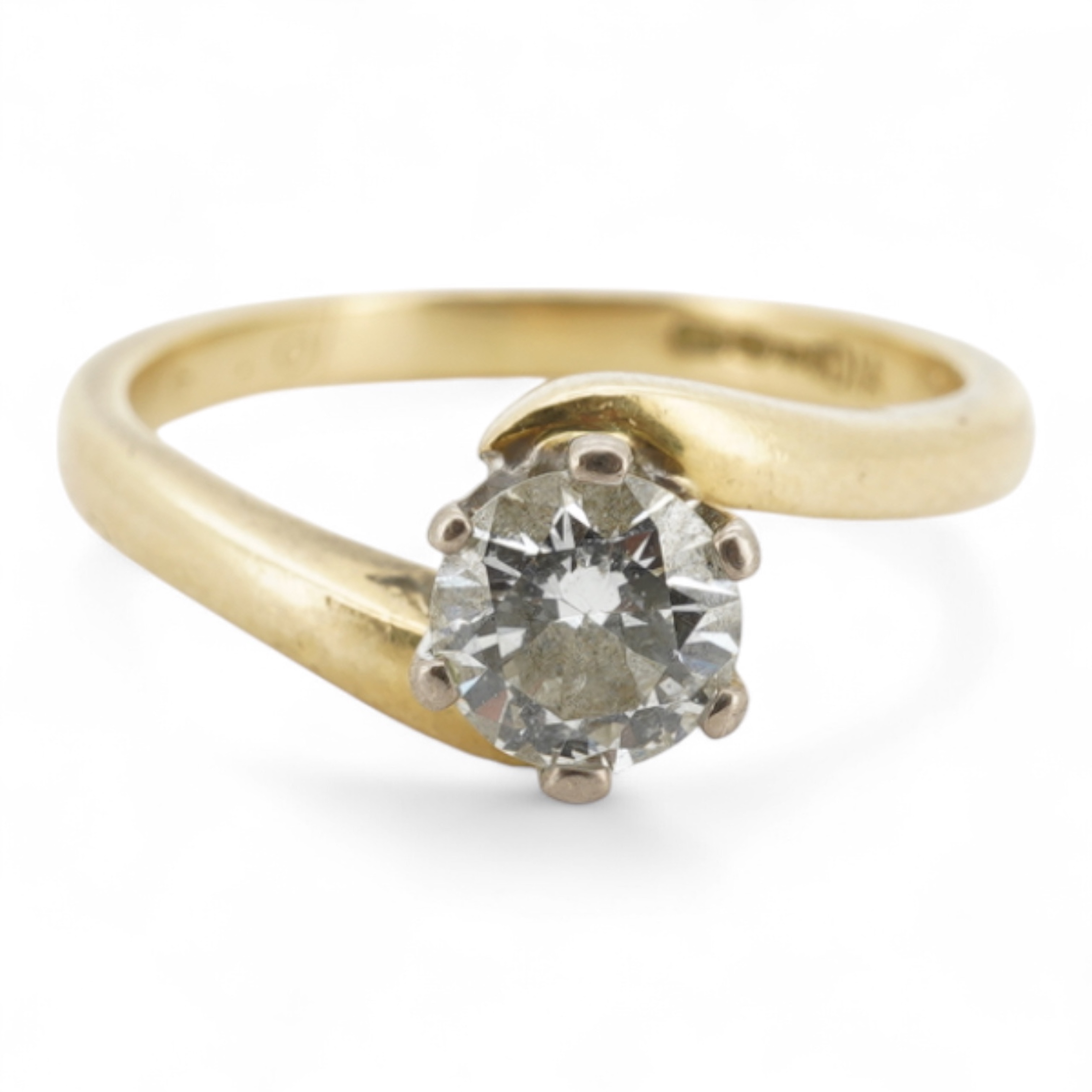 A diamond solitaire ring, claw-set with a brilliant-cut diamond weighing approximately 0.50 carats, to an symmetrical 18ct gold mount, size I, British hallmarks, gross weight approximately 3 grams